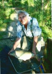 This is Archie Scragg with a lovely common carp.  Archie is a regular visitor to our campsite.