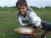 This is Charlie Towner on only his 2nd day's fishing when he caught this beautiful 6lb 4oz common carp from Rushcombe lake.
 
He caught it using luncheon meat on a size 10 hook with his brand new quiver rod. 