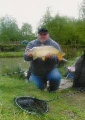 This is Chris Dring with a fabulous 7.5lb common carp from the North Pool.  Chris, who is an Aerospace fitter, came fishing for the first time in 44 years!  He used worm with no other feed, a 16 hook and 6lb line out in open water.
