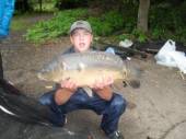 This is Danny Clayton with a lovely 12 pounder from the Carp Lake.