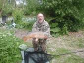 This is Dave Brown with a superb 18.5lb fish from peg 13 of the Carp Lake - caught on plastic corn.