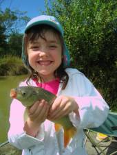 Lucy, aged 5, fished with her Grandad on Rushcombe Lake using single sweetcorn on a size 18 hook.