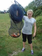 This is Martin Jones' daughter who caught around 24 fish from Rushcombe using mainly maggot on a 3 meter whip and a light rig.