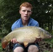 Here's Mitchell Davenport with a lovely 11.4lb common from the Carp Lake.