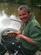 Phil has caught his first fish from peg 28 of the Match Lake under the expert guidance of Shawn Kitteridge.  Phil estimated his lovely crucian was at least 10lb - I think he didn't have his glasses on and he wasn't using any scales!
