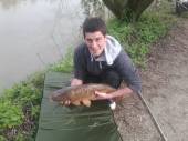 Sam Hutchings with one of the new specimen carp in the Carp Lake.