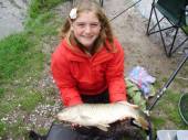 Here's Sarah again with another lovely carp.  She and Dad, Simon, used 16 hooks, 3.5lb line on float fished maggot.